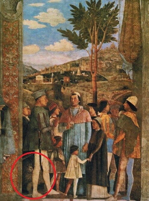 Das Fresko "Die Rückkehr der Kardinals Gonzaga" von Andrea Mantegna zeigt einen Hund, der dem Spinone Italiano sehr ähnlich sieht.